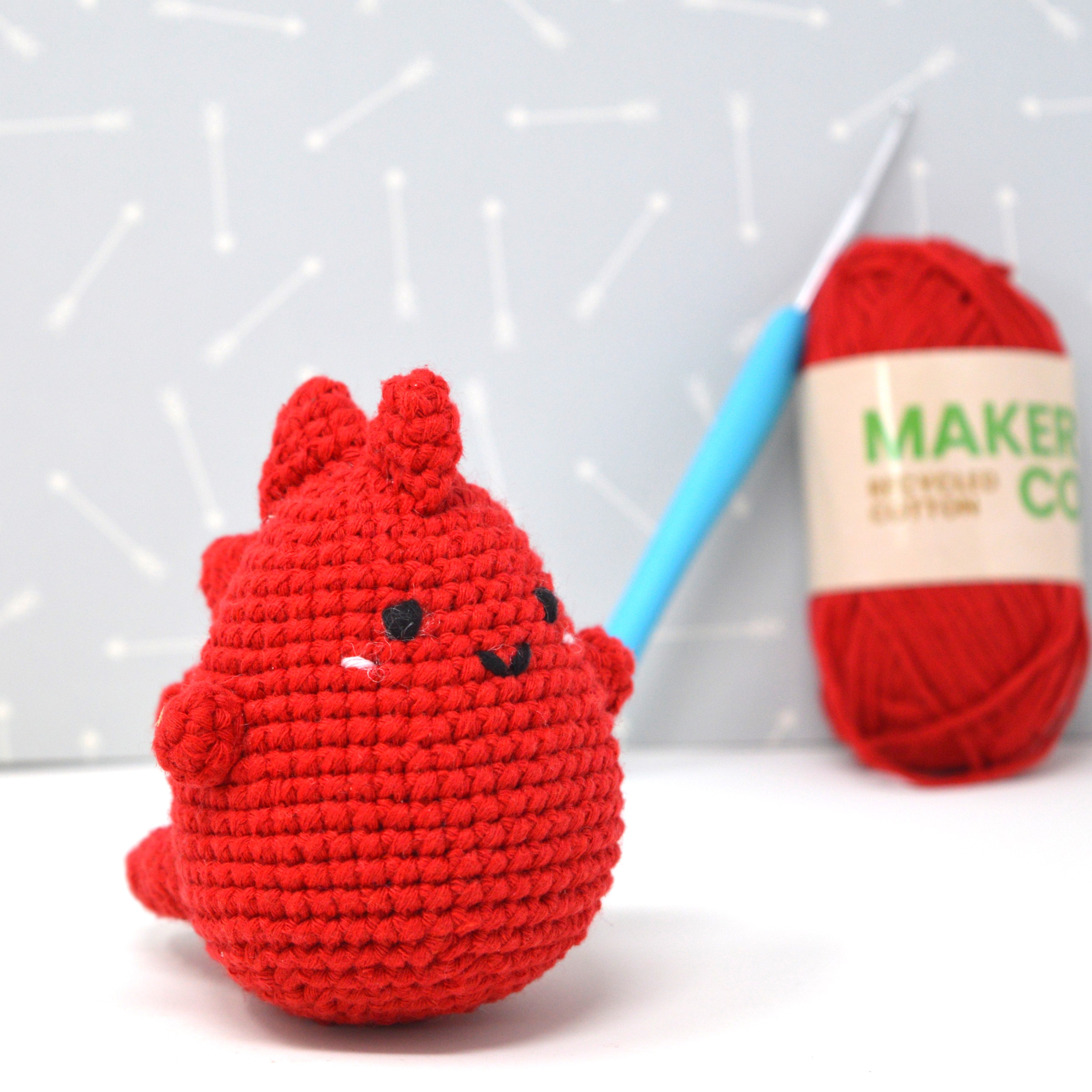 Knitty Critters - Pouch Pals II - Dennis The Dino | DIY Amigurumi Crochet Kit